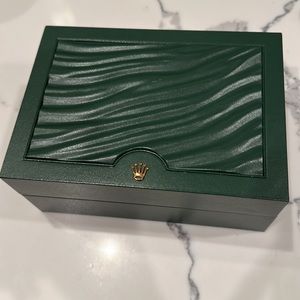 Rolex box. Never used. No watch, just the box the watch came in.